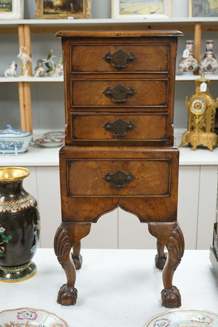 An early 20th century miniature walnut four drawer chest, 67cm